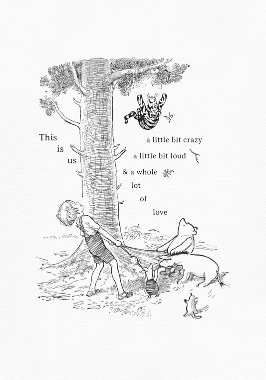 A black and white illustration of Christopher Robin pulling a blanket attached to Winnie the Pooh, Eeyore and Piglet. Tigger is hanging upside down from a tree branch above them. A Roo is standing on its hind legs watching the scene. Addet text reads: "This is us, a little bit crazy, a little bit loud, and a whole lot of love"