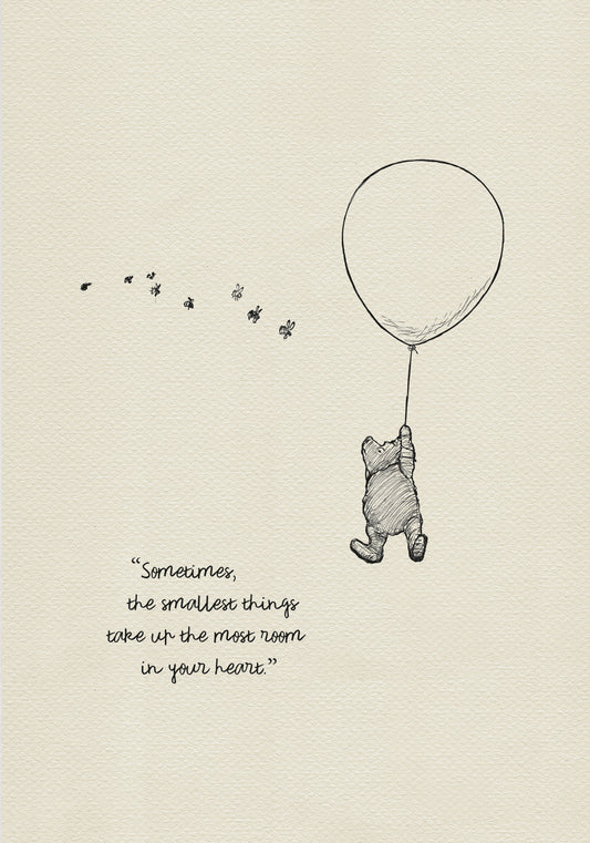 A black and white illustration of Winnie the Pooh holding onto a balloon. Winnie the Pooh is flying up into the air. There are small bees flying around him. The text reads 'Sometimes the smallest things take up the most room in your heart.'