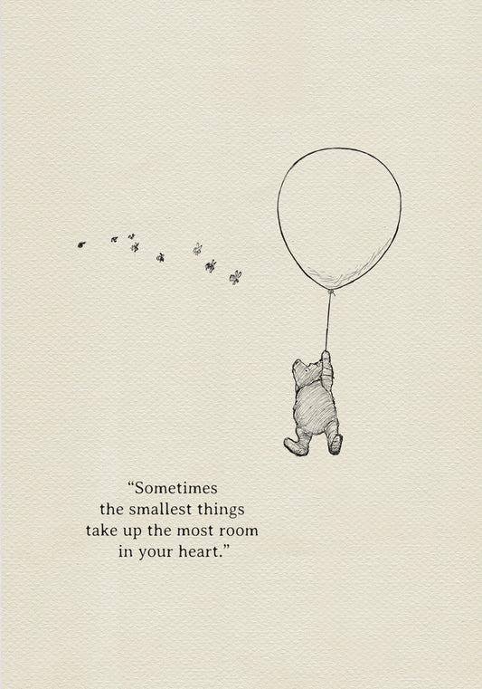 A black-and-white illustration showing Winnie the Pooh being lifted into the air by a balloon held in his paw. Bees are flying around him. The text 'Sometimes, the smallest things take up the most room in your heart.' is below the illustration.