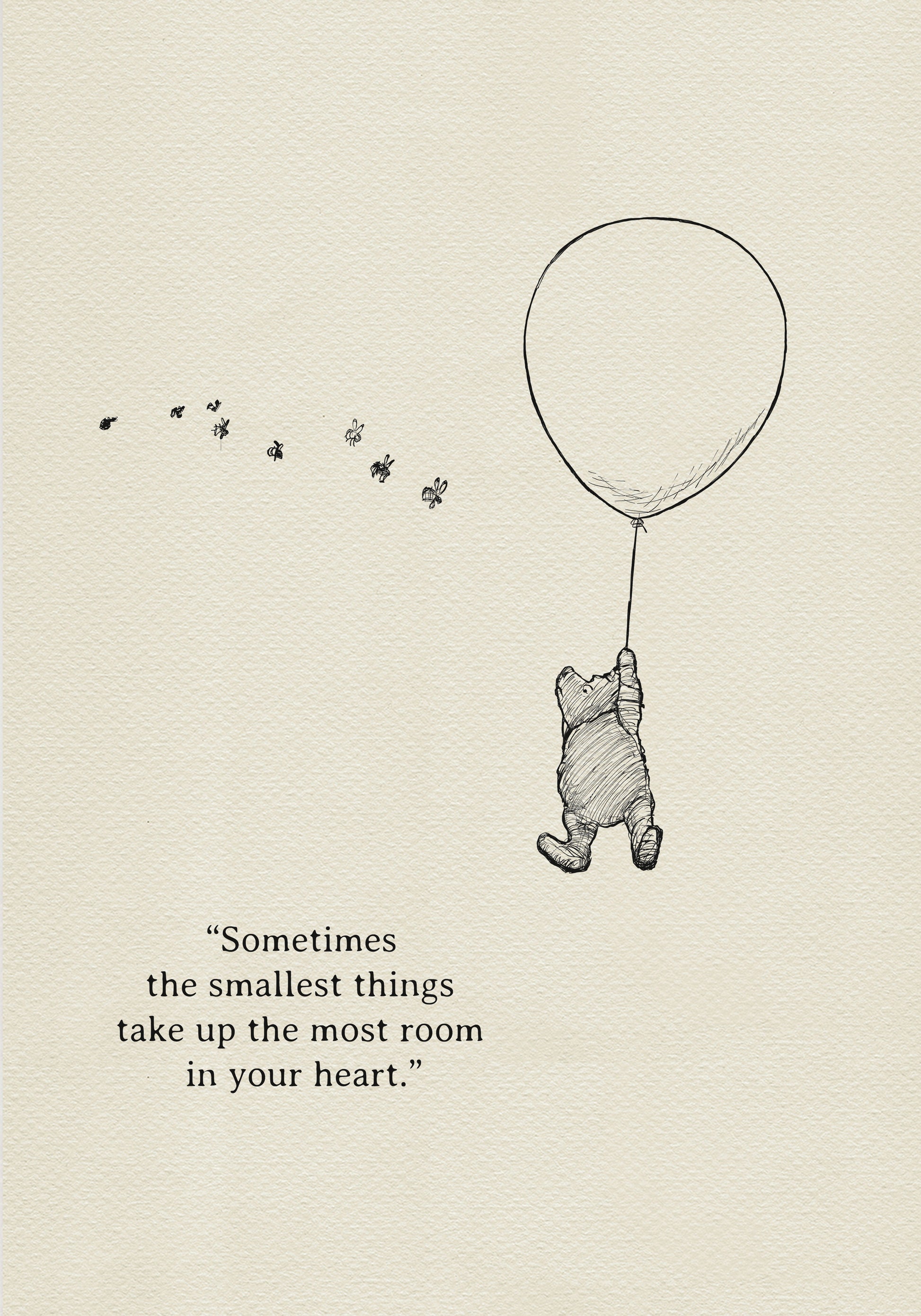 A black and white illustration of Winnie the Pooh holding onto a balloon. Winnie the Pooh is flying up into the air. There are small bees flying around him. The text reads 'Sometimes the smallest things take up the most room in your heart.'