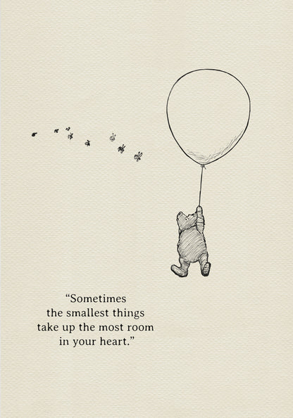 A black and white illustration of Winnie the Pooh holding onto a balloon. Winnie the Pooh is flying up into the air. There are small bees flying around him. The text reads 'Sometimes the smallest things take up the most room in your heart.'